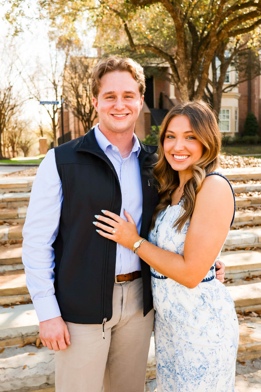 Engaged couple on stairs